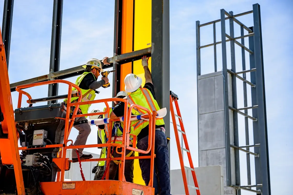 Maintenance crew working on a commercial building exterior